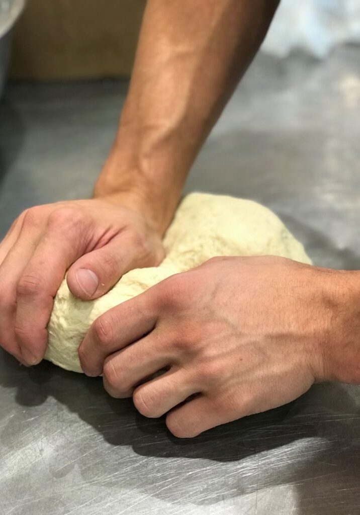 kneading cannoli dough